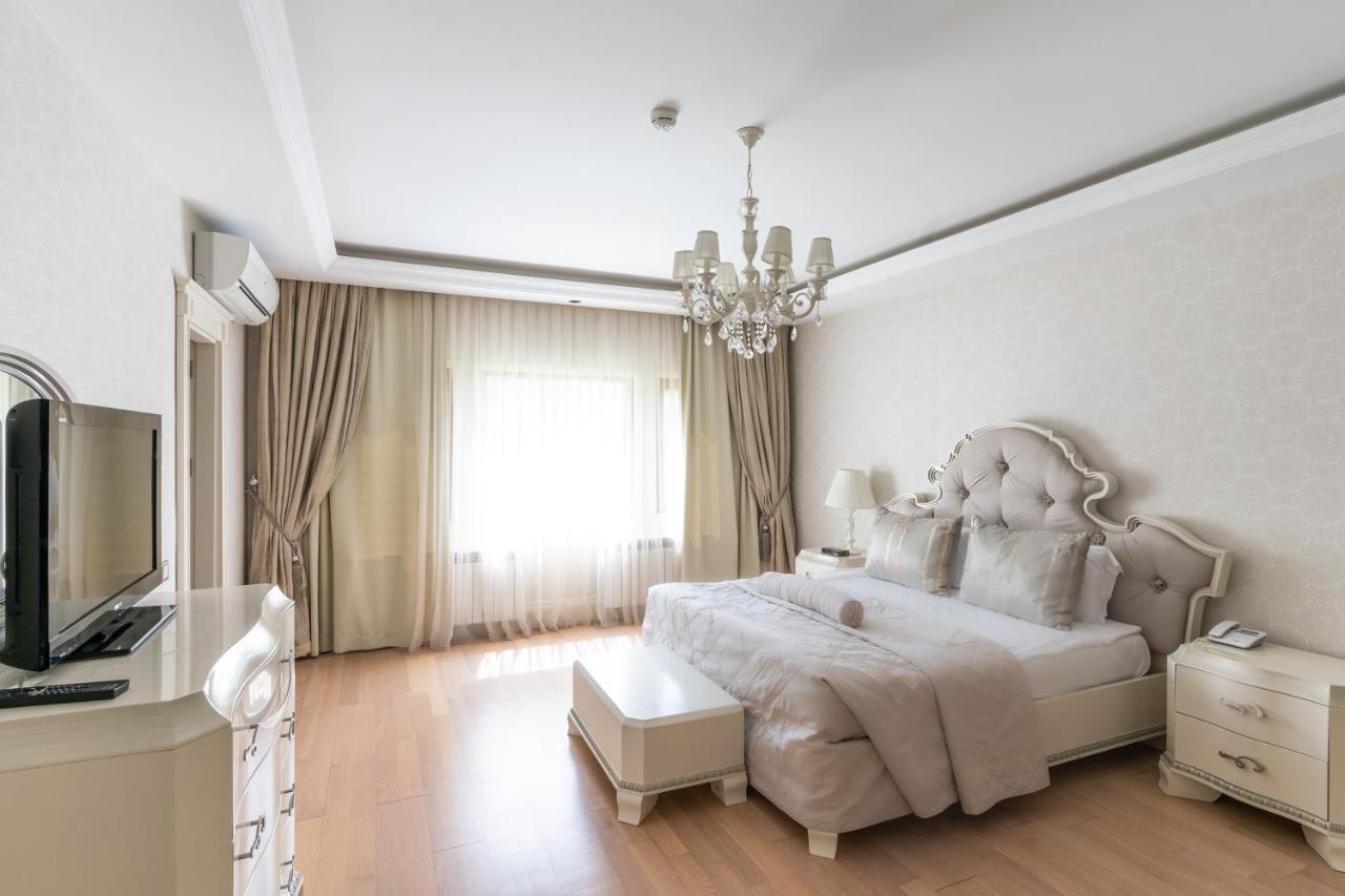 Qafqaz Riverside Hotel Qəbələ Exterior foto A bedroom