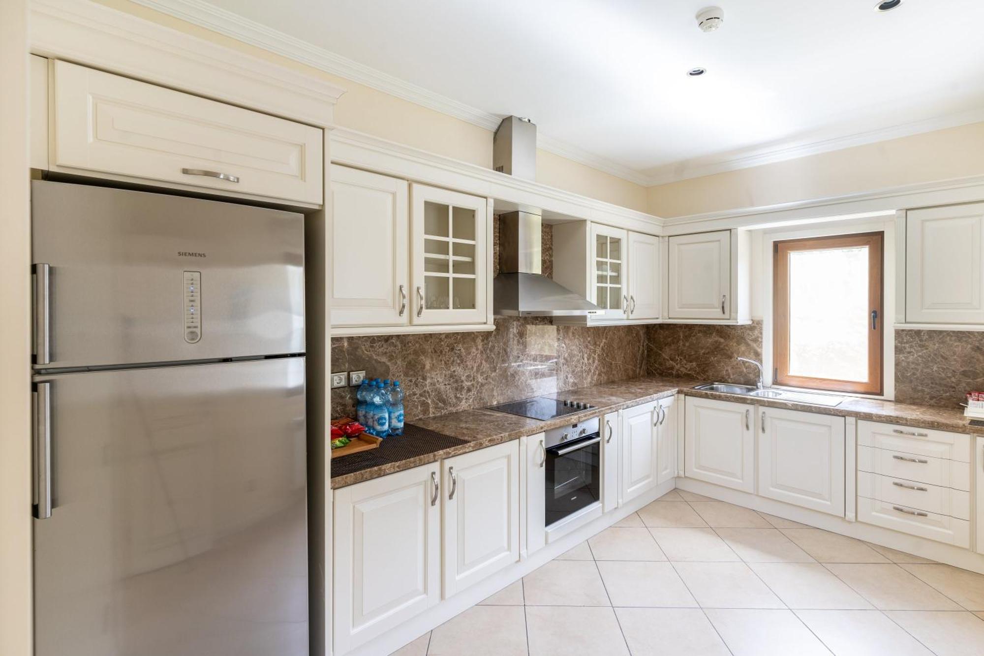 Qafqaz Riverside Hotel Qəbələ Exterior foto A modern kitchen